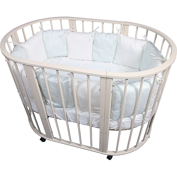 Овальная детская кроватка Nastella Baby Molly 7 в 1 без маятника фото 2
