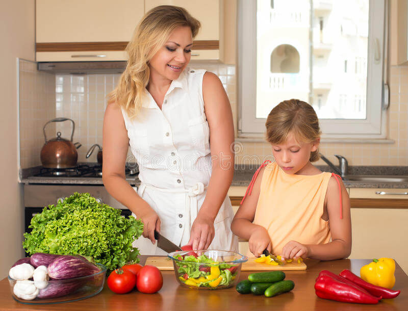 mother-daughter-cooking-together-help-children-to-parents-healthy-domestic-food-concept-young-women-girl-making-fresh-69346917.jpg