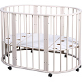 Овальная детская кроватка Nastella Baby Molly 7 в 1 без маятника (Слоновая кость) — Фото