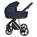 Детская коляска Roan Sol Luxury 2 в 1 на золотой раме (RSL/4047 Mystic Blue/Rose Gold/т.коричневая ручка
						
					) — Фото